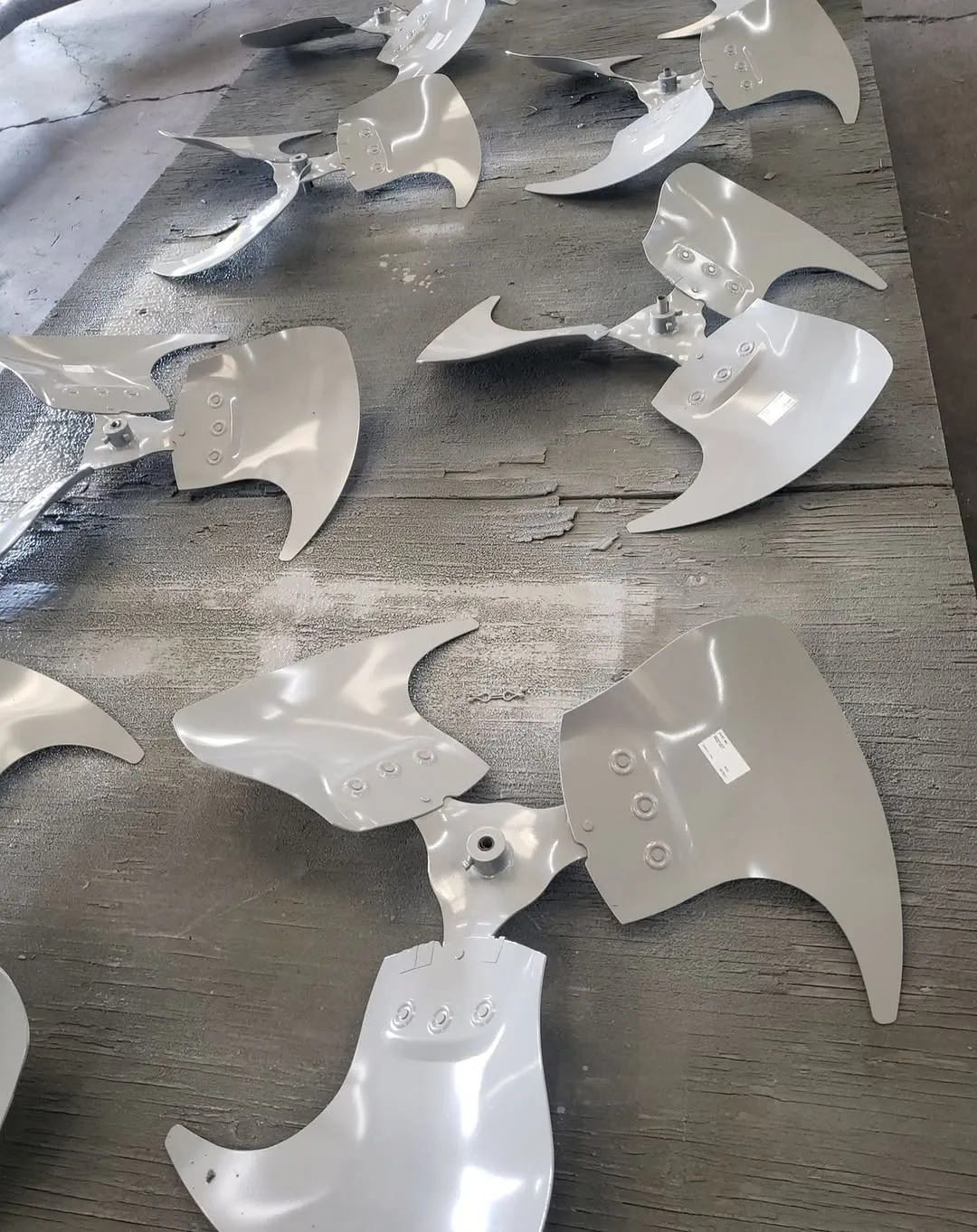 Bulk disassembled units during coating application.